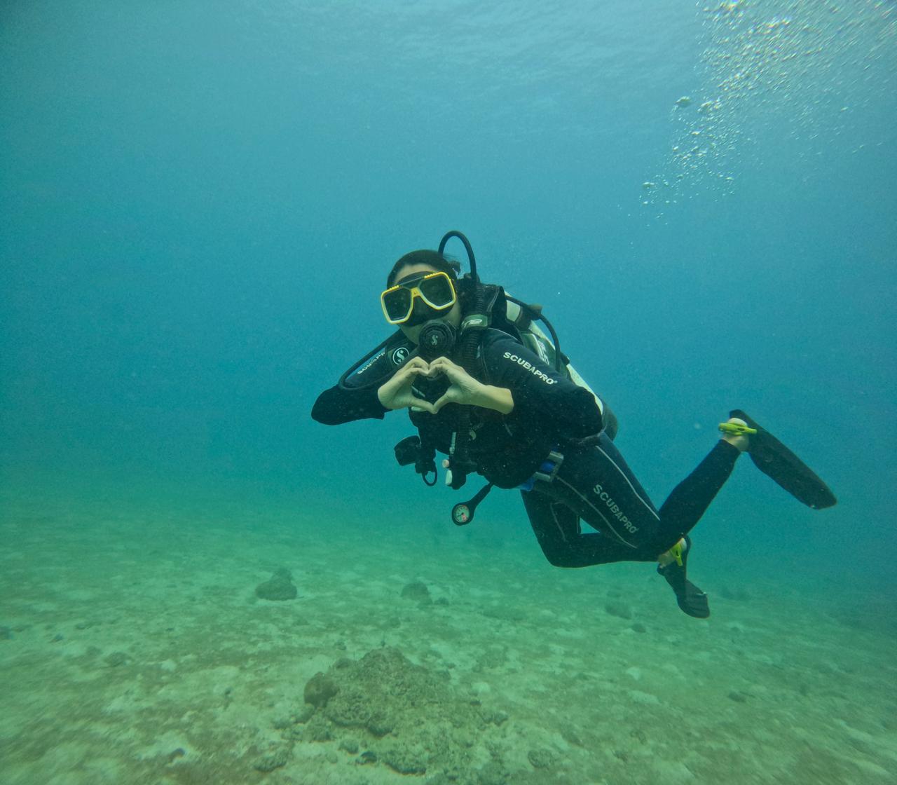 Scuba diving — heart hands underwater